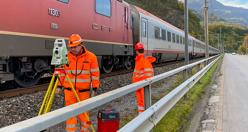 man performing monitoring measurements with Leica Geosystems total station